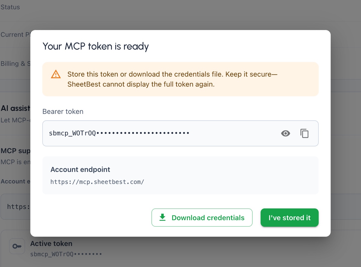 One-time Sheet Best MCP token dialog showing the hosted endpoint, download action, and the full dialog shadow.